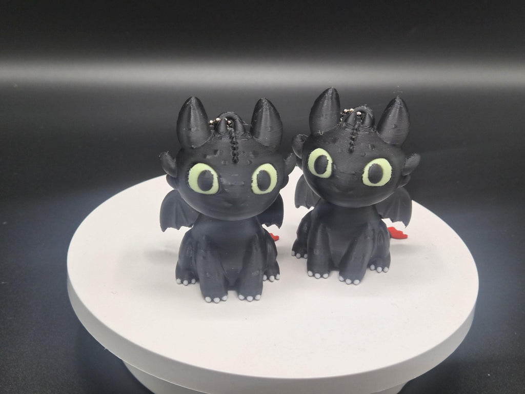 Toothless and Light Fury Clicker Keychains | How to Train Your Dragon