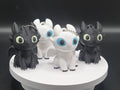 Toothless and Light Fury Clicker Keychains | How to Train Your Dragon