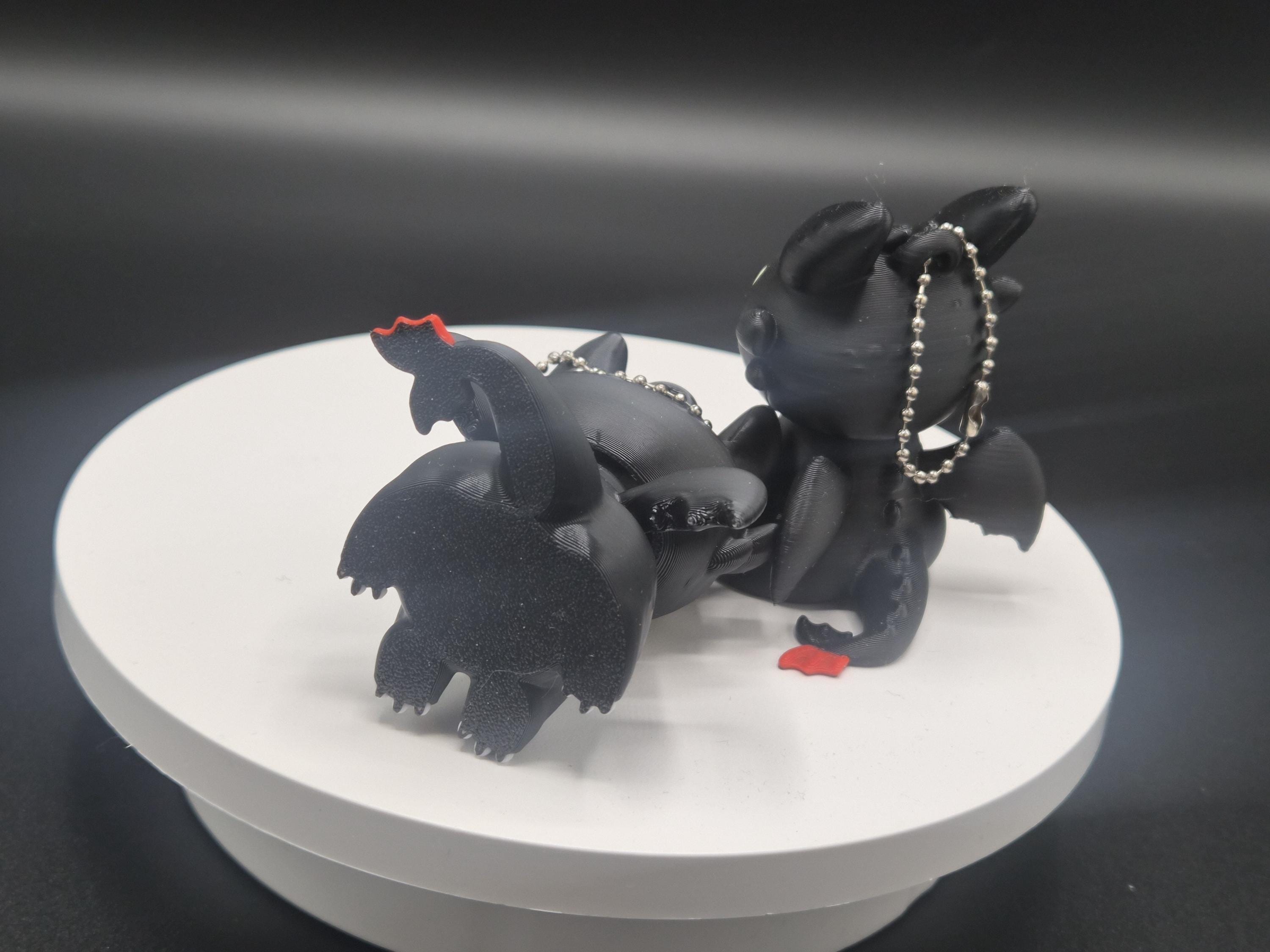 Toothless and Light Fury Clicker Keychains | How to Train Your Dragon