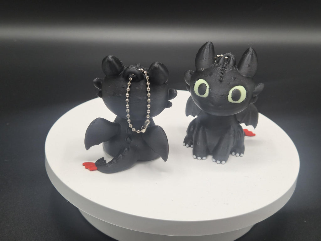 Toothless and Light Fury Clicker Keychains | How to Train Your Dragon
