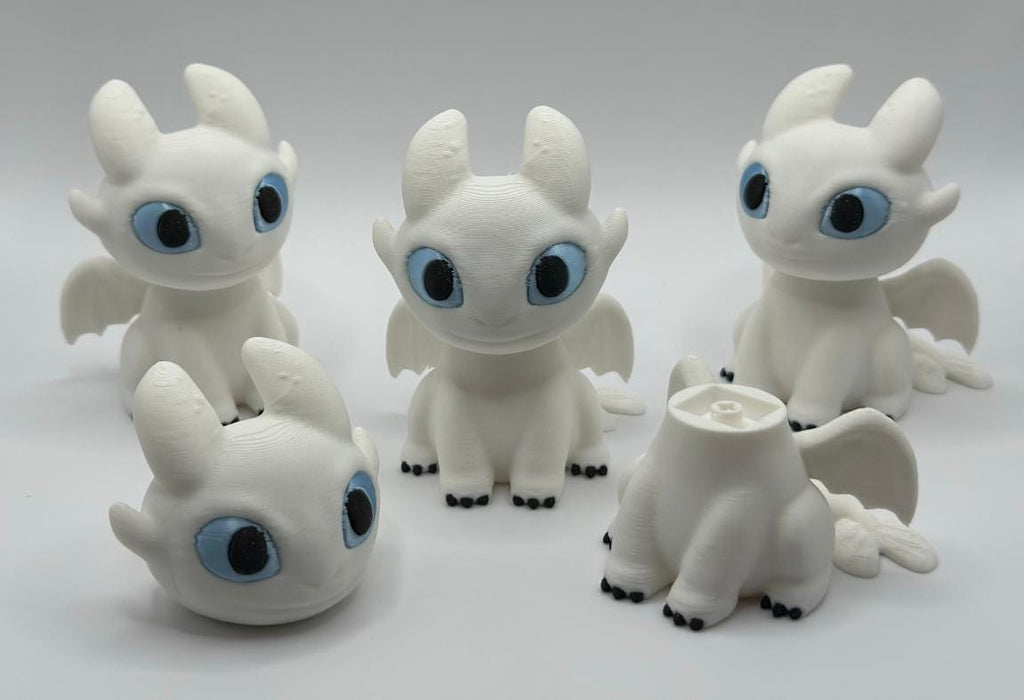 Toothless and Light Fury Clicker Keychains | How to Train Your Dragon