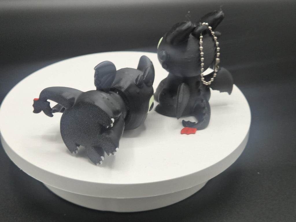 Toothless and Light Fury Clicker Keychains | How to Train Your Dragon